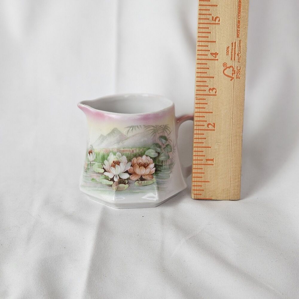 Beautiful‎ vintage mini pitcher or creamer made in Austria!